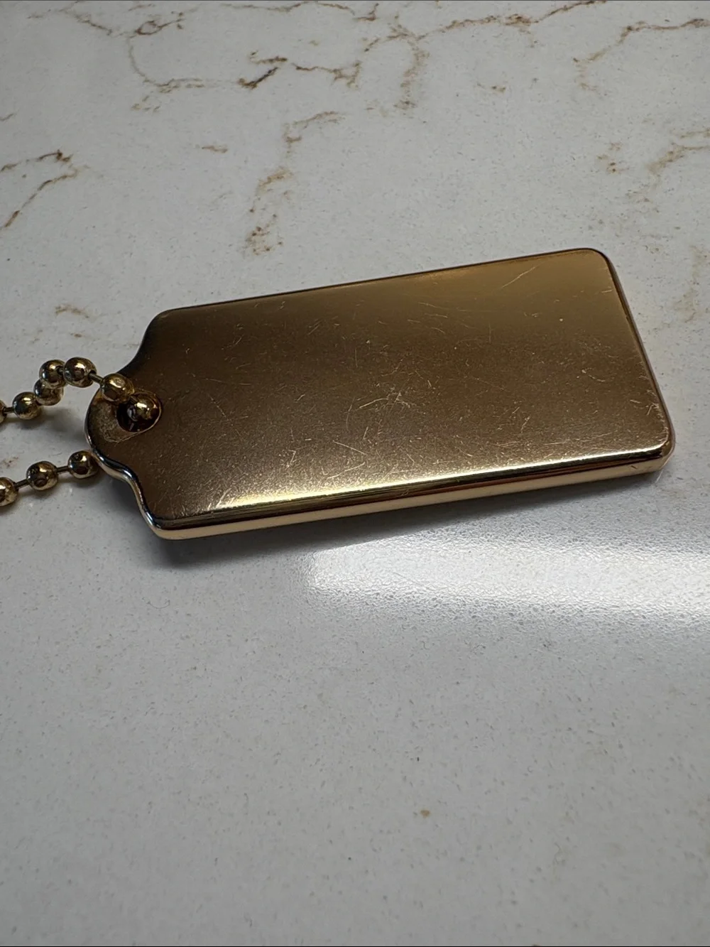 Coach Gold Metal Hangtag